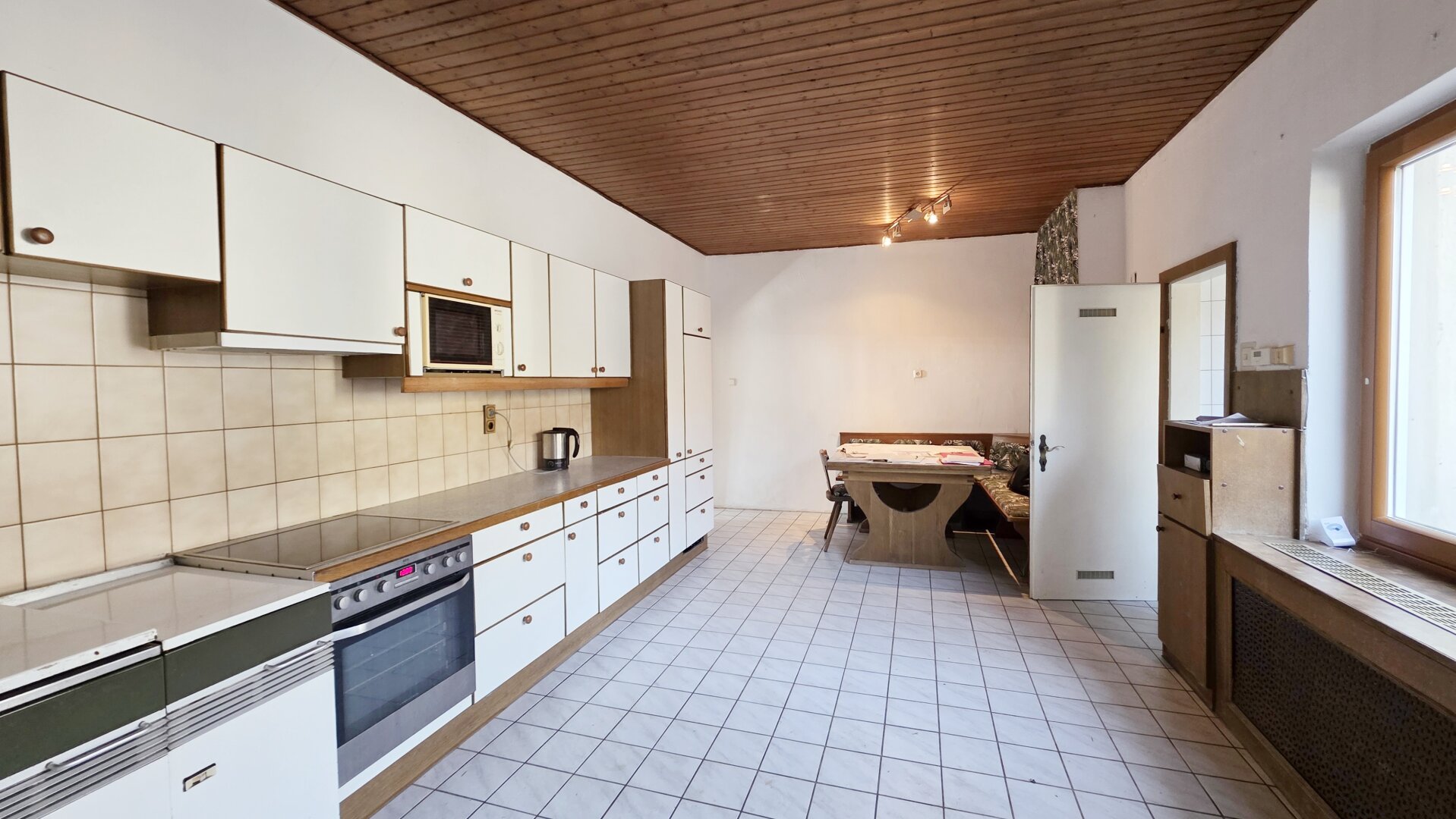 Hausanteil mit Garten und Nebengebäude