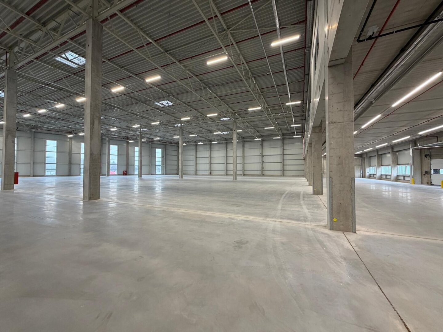 NEUBAU  - Produktions / Lagerhalle mit Büroflächen in Enns/Ennshafen zu vermieten – individuell und zukunftsorientiert