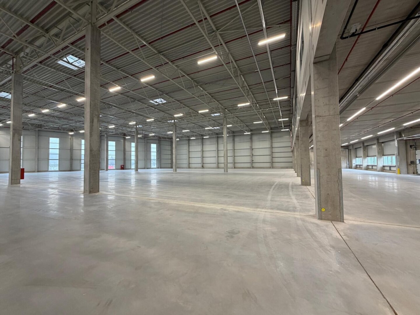NEUBAU  - Produktions / Lagerhalle mit Büroflächen in Enns/Ennshafen zu vermieten – individuell und zukunftsorientiert