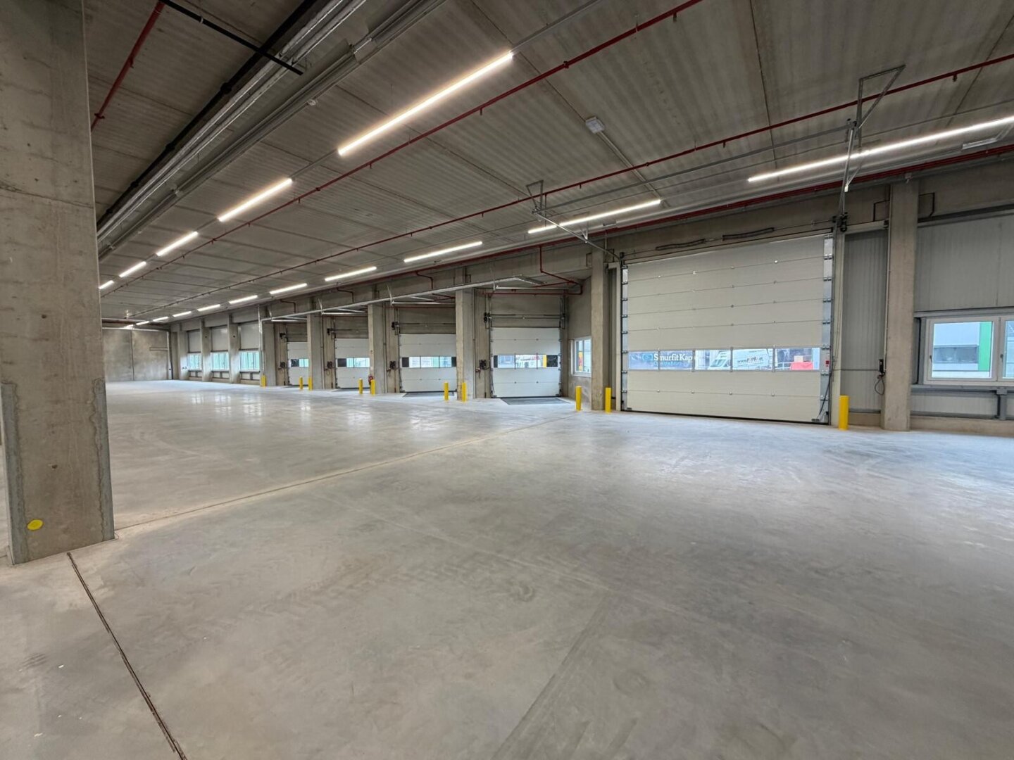 NEUBAU  - Produktions / Lagerhalle mit Büroflächen in Enns/Ennshafen zu vermieten – individuell und zukunftsorientiert