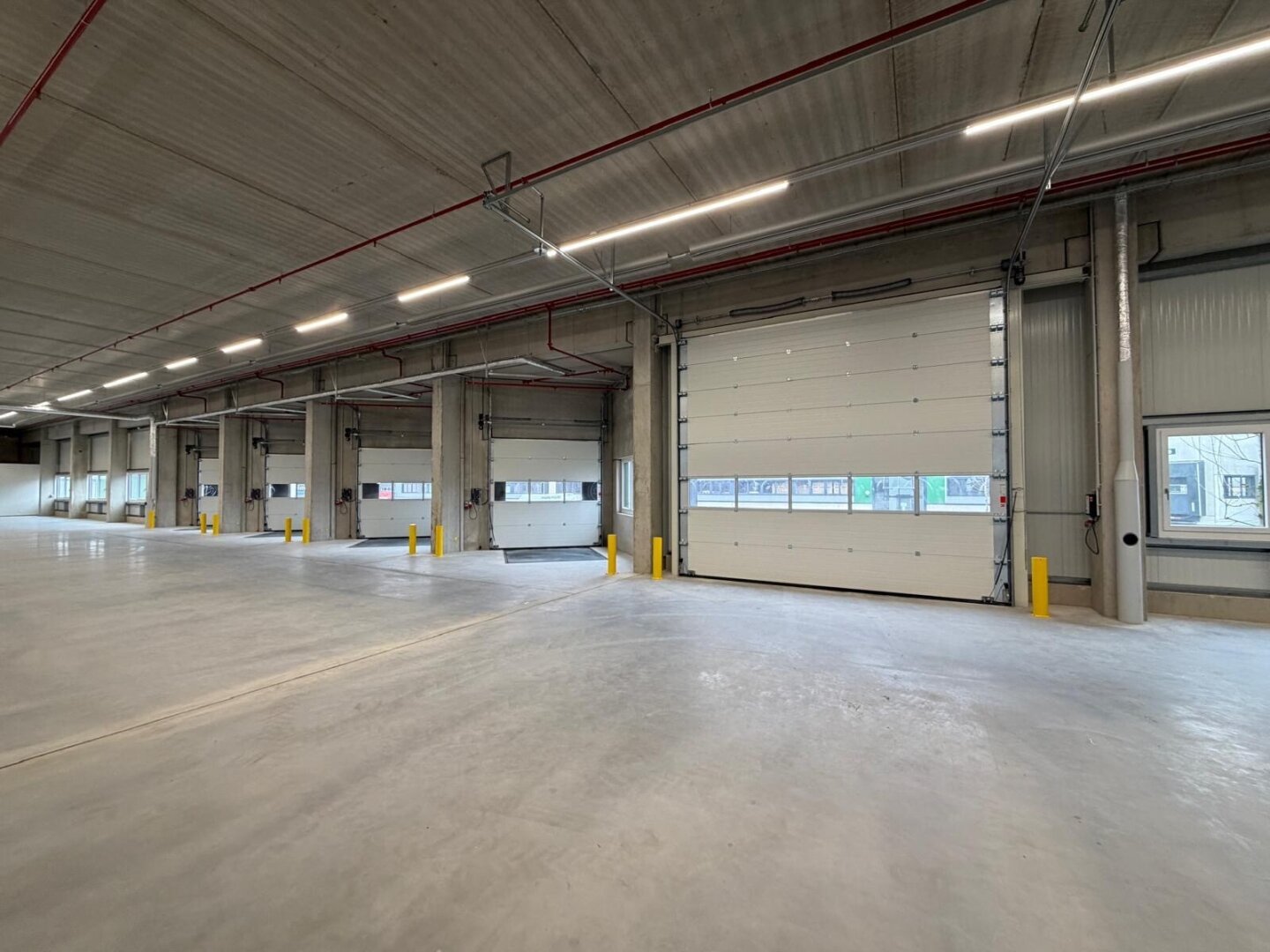 NEUBAU  - Produktions / Lagerhalle mit Büroflächen in Enns/Ennshafen zu vermieten – individuell und zukunftsorientiert