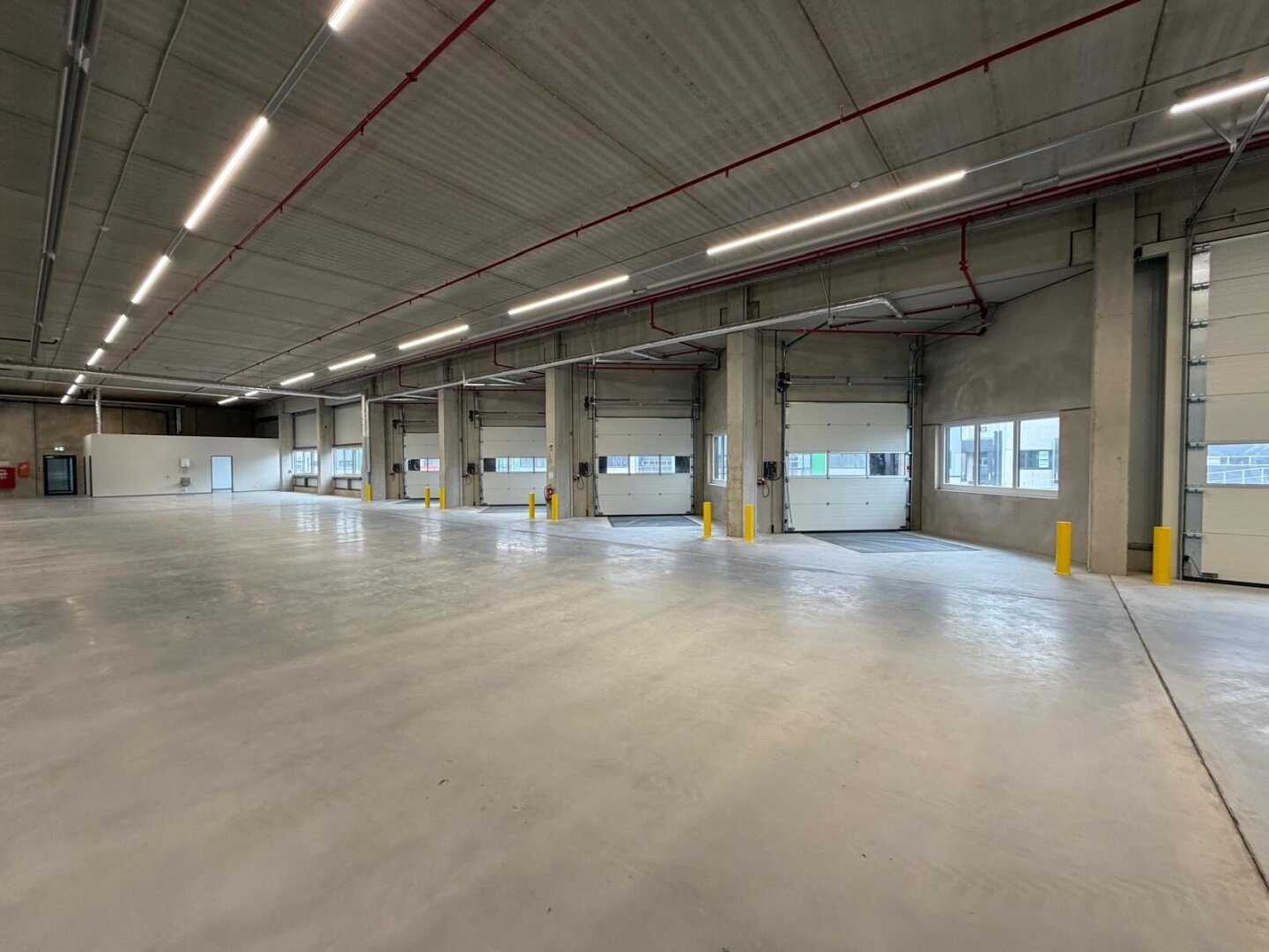 NEUBAU  - Produktions / Lagerhalle mit Büroflächen in Enns/Ennshafen zu vermieten – individuell und zukunftsorientiert
