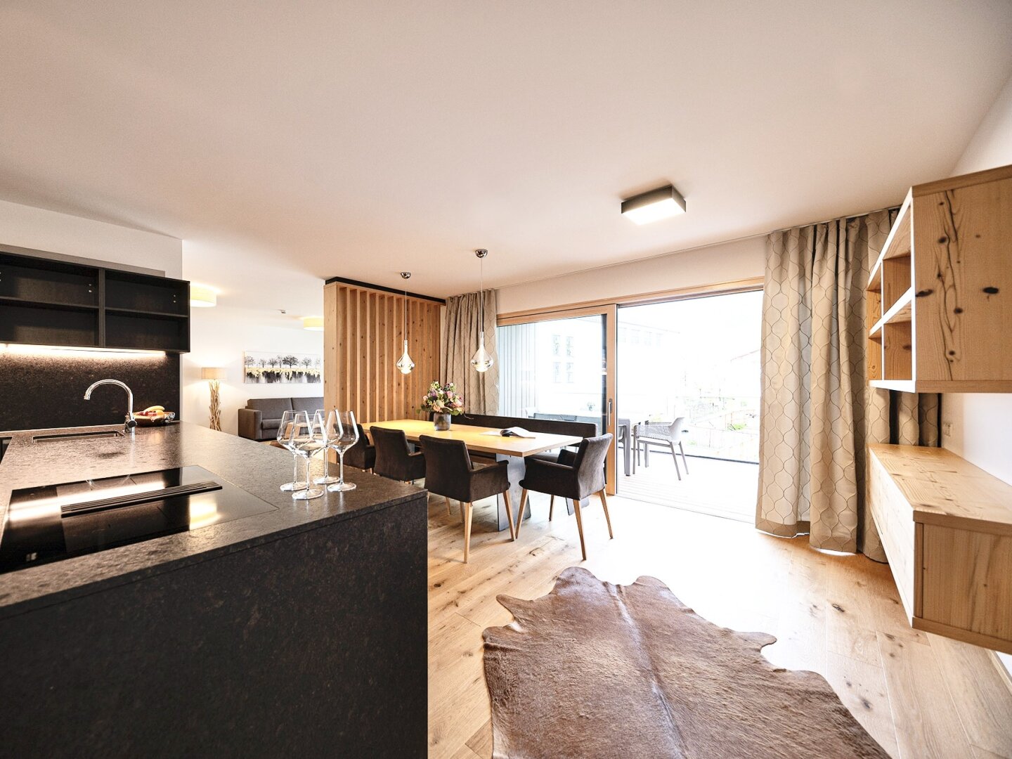 Bestlage Pinzgau mit ca. 6% Rendite! Sieben Apartments mit Terrassen, Balkonen und beheiztem Aussenpool