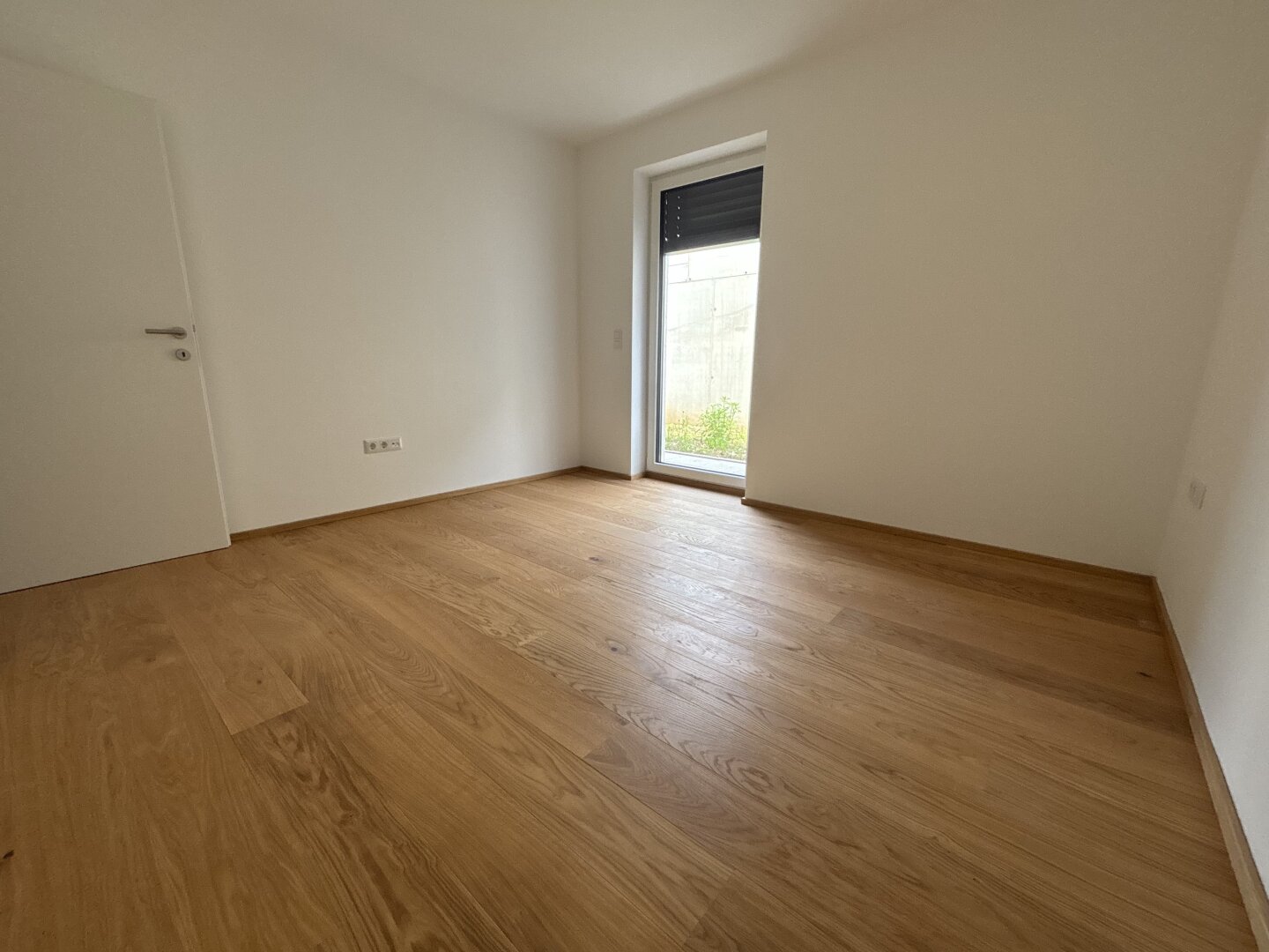 Moderne Erstbezugswohnung mit Garten & Doppelcarport!