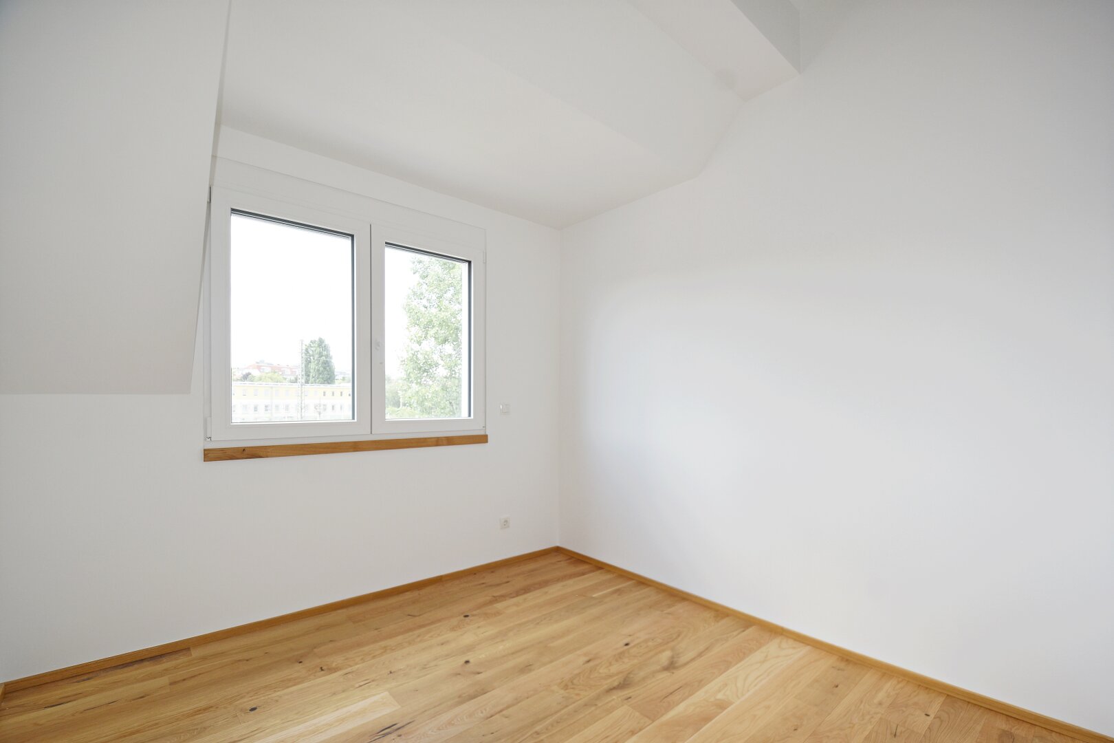 Wunderschöne Dachgeschosswohnung mit Eigengarten