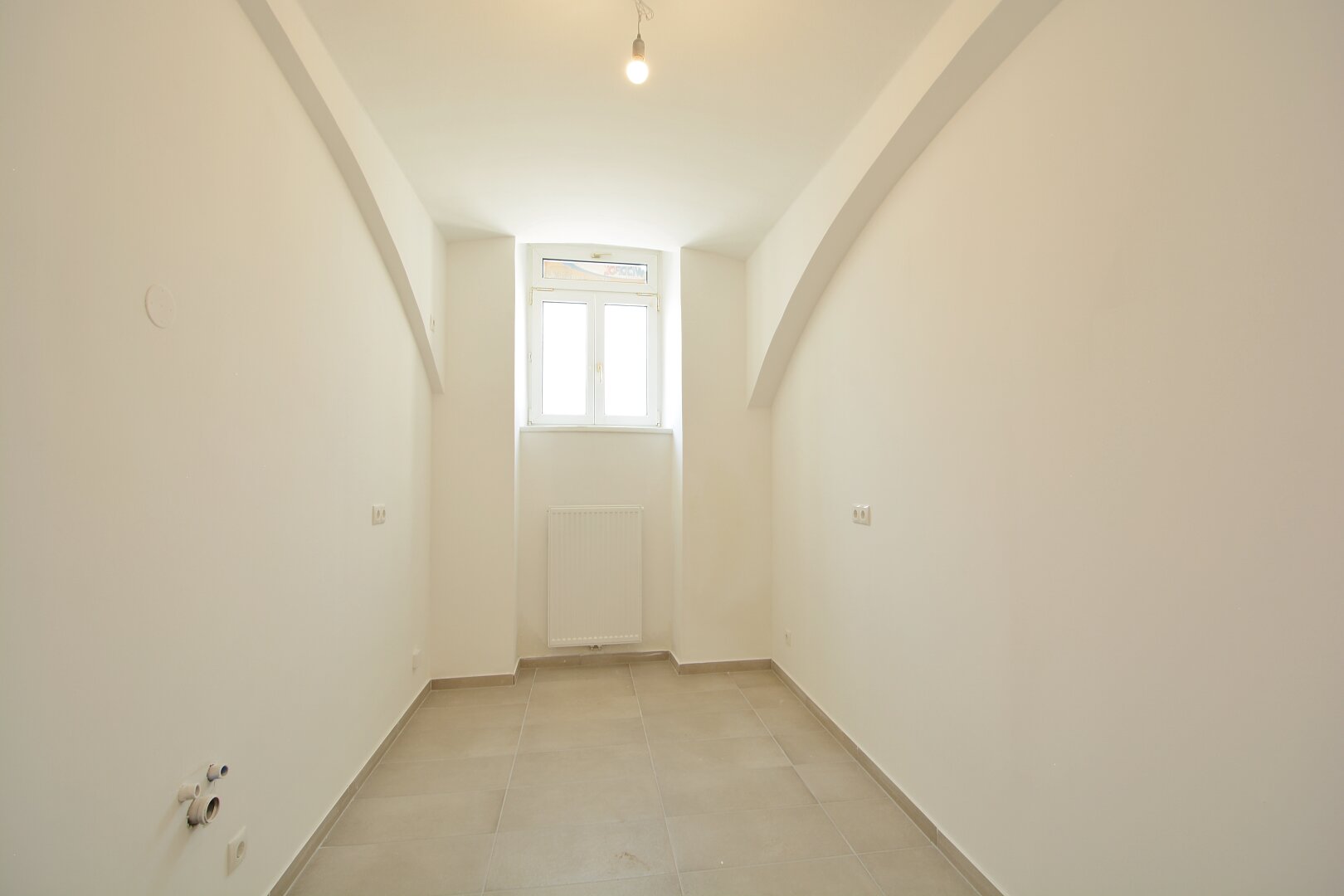 Bezaubernde Souterrain-Wohnung mit 53 m² und Gartenanteil - ideal für Singles oder als Investment!