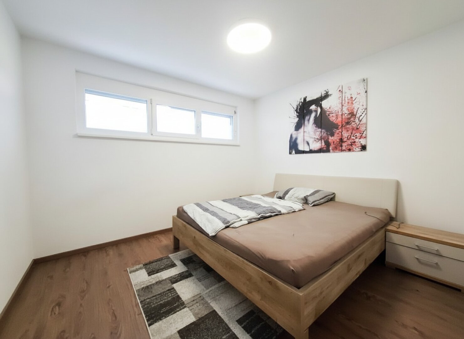 Moderne Terrassenwohnung mit privatem Garten