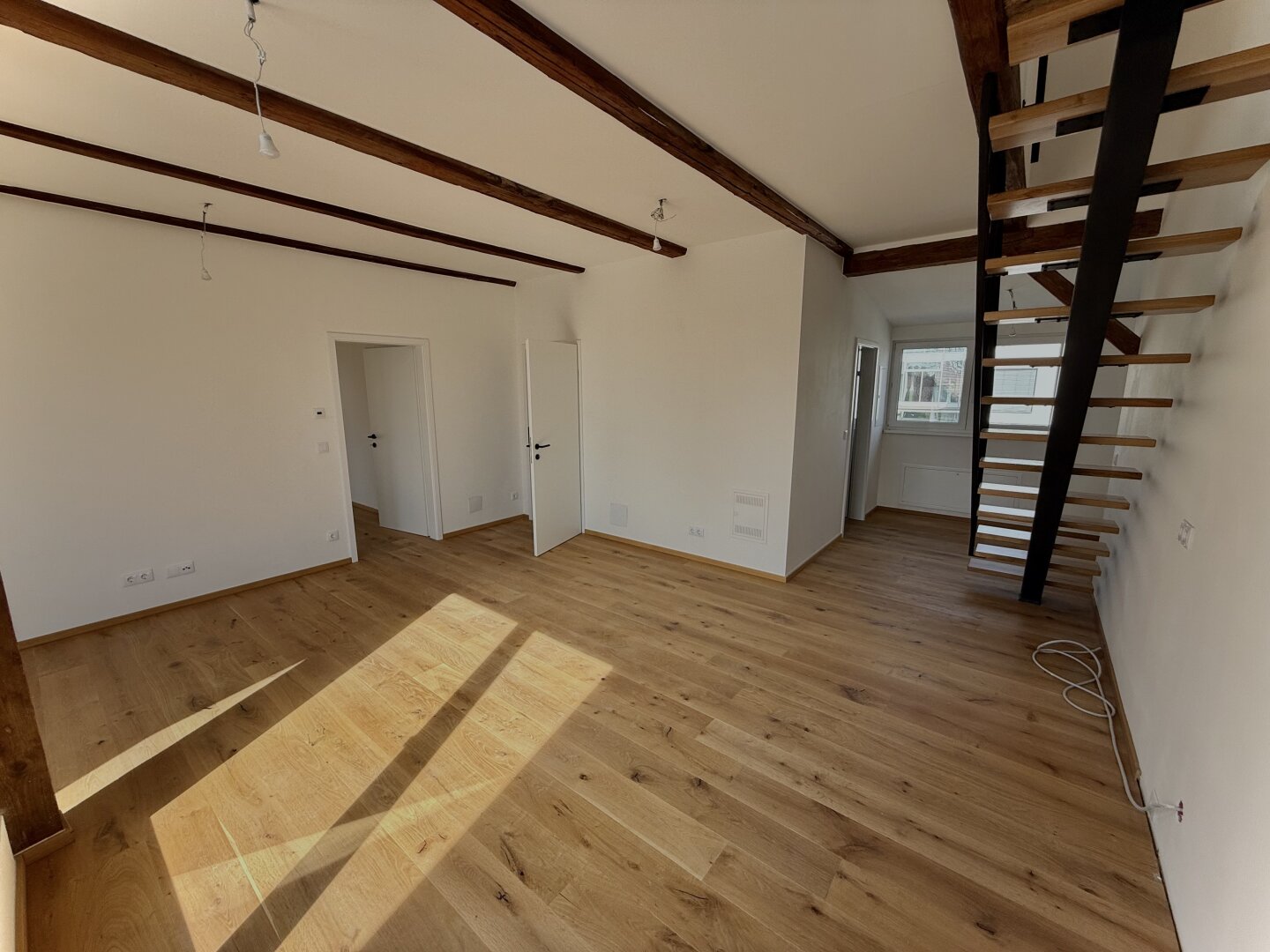 Bestlage: Charmanter Neubau mit sonnigem Westbalkon und Grünblick!