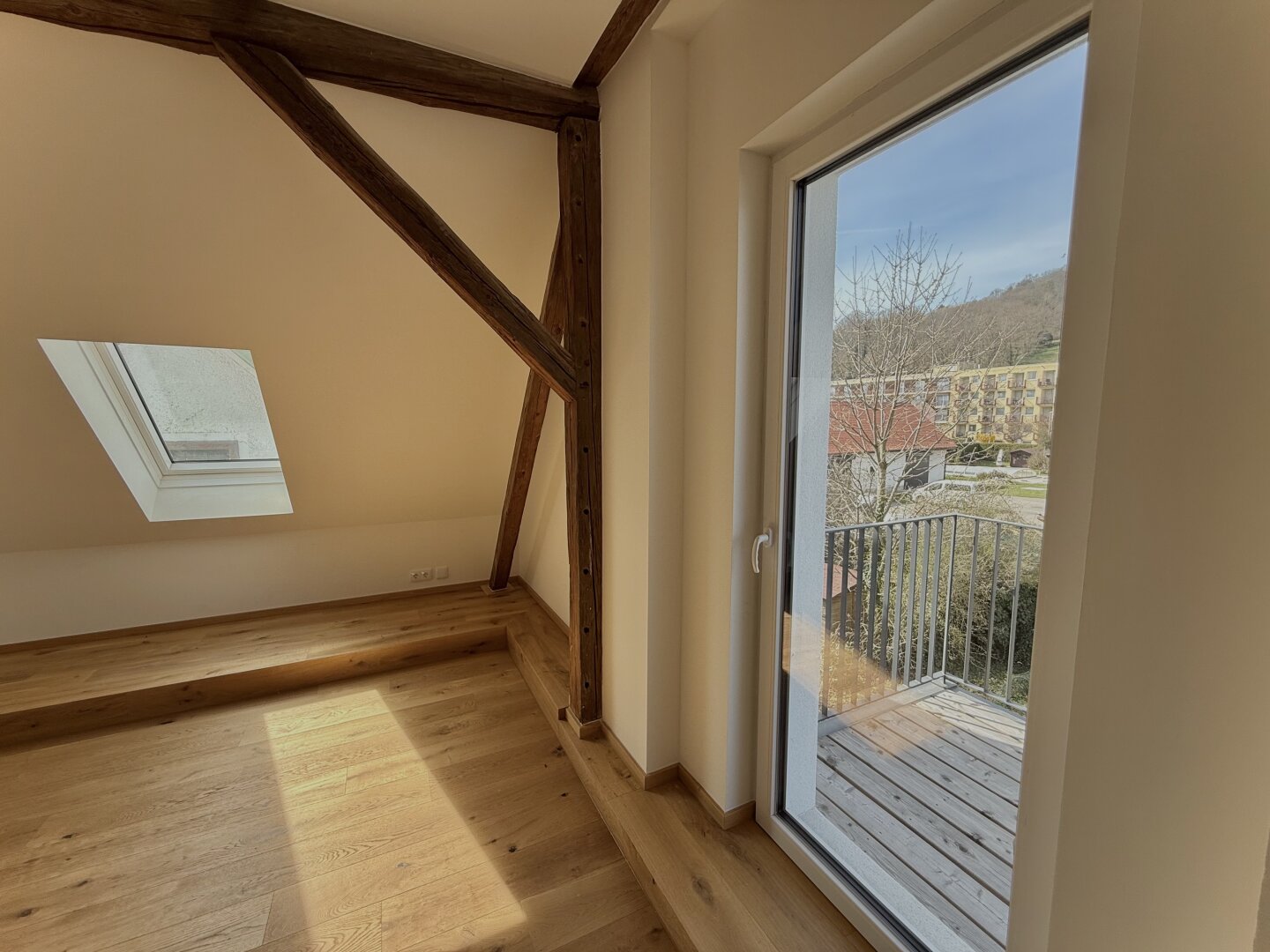 Bestlage: Charmanter Neubau mit sonnigem Westbalkon und Grünblick!