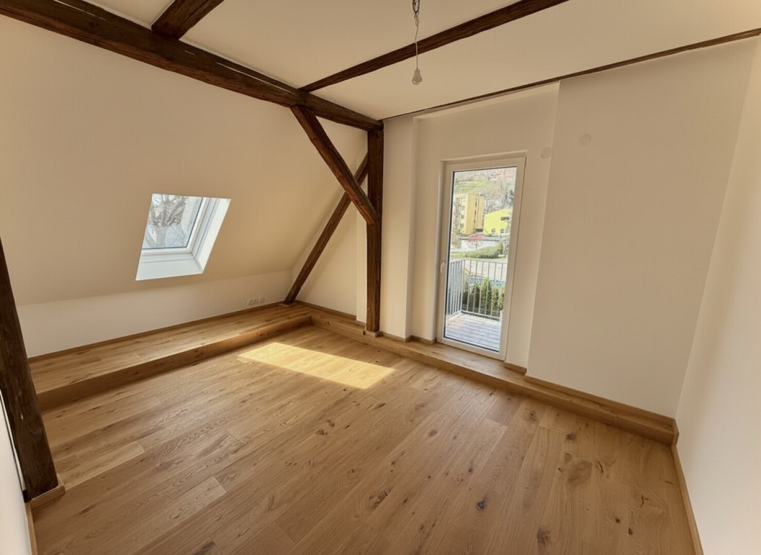 Bestlage: Charmanter Neubau mit sonnigem Westbalkon und Grünblick!