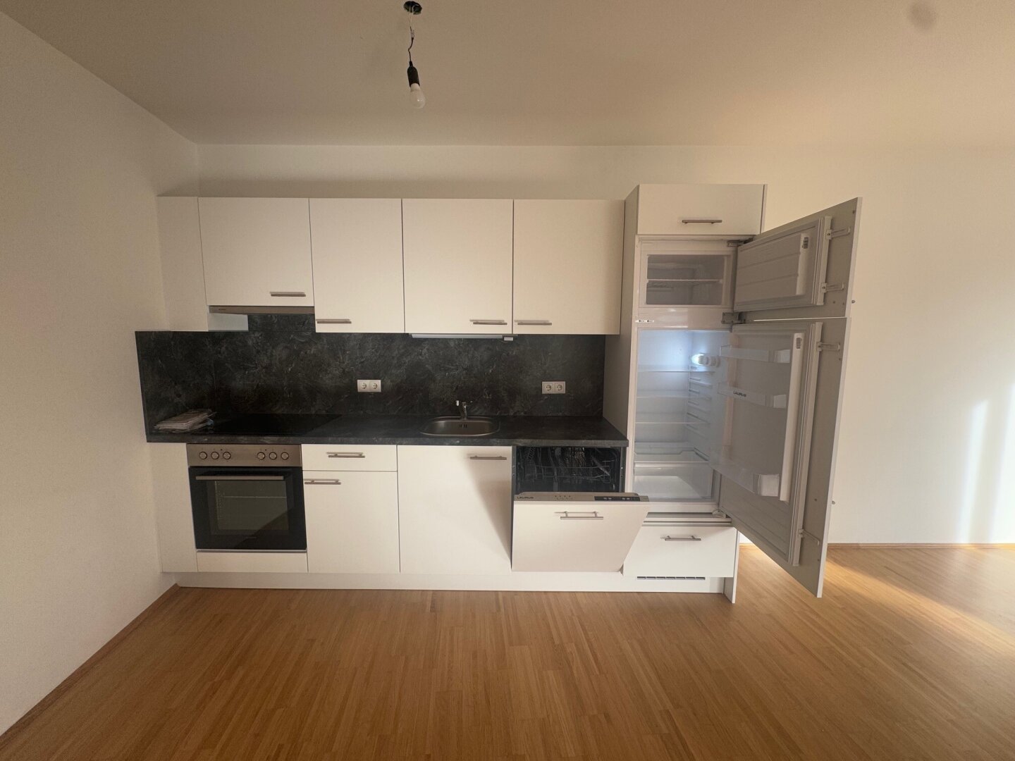 Großzügige Neubau-Wohnung mit privatem Garten und Sonnen-Terrasse