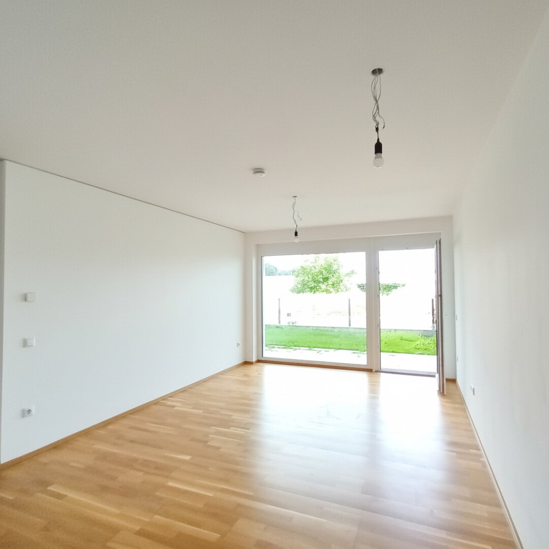Neubau-Erdgeschoss mit Traumgarten – ideal für Singles & Paare!