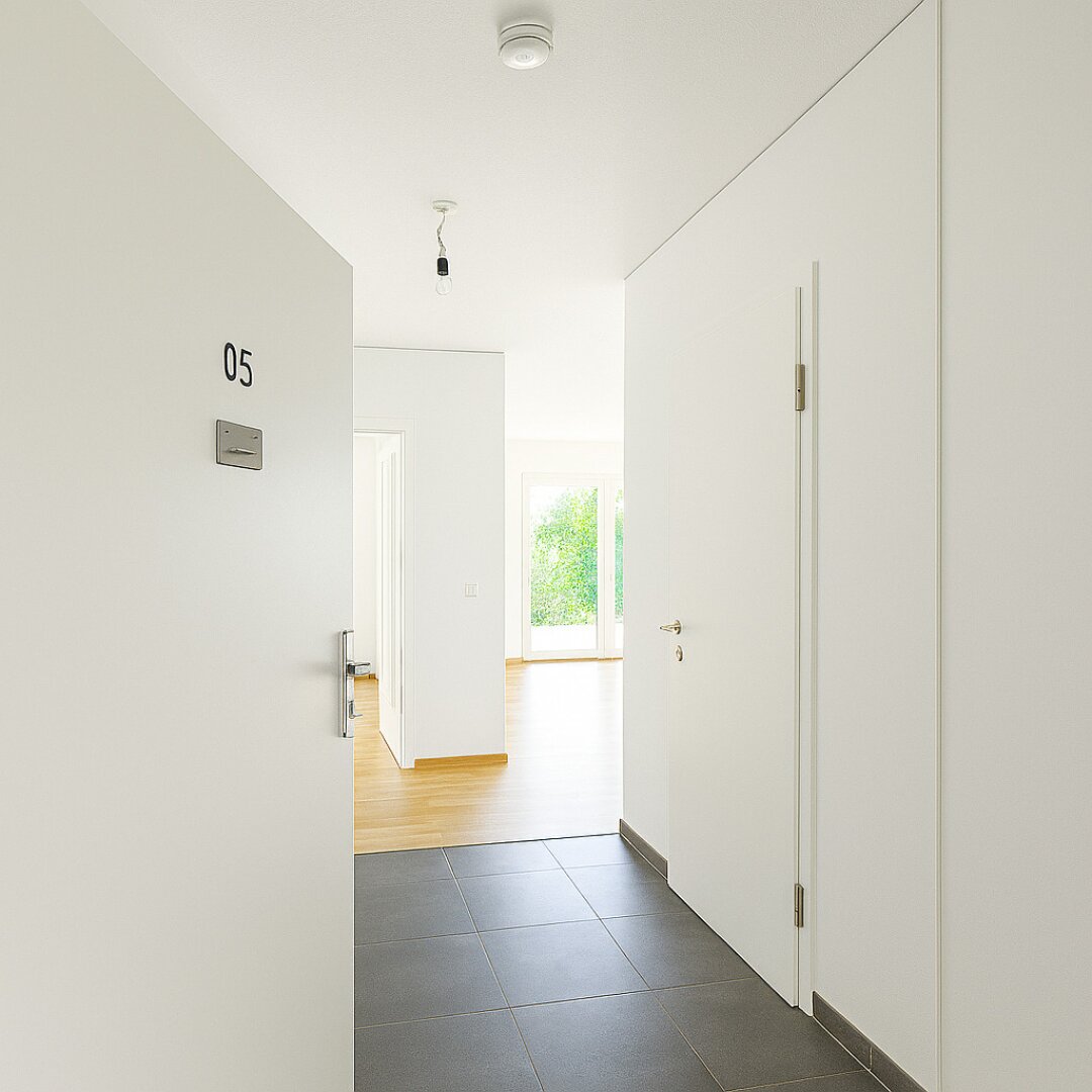 Neubau-Erdgeschoss mit Traumgarten – ideal für Singles & Paare!