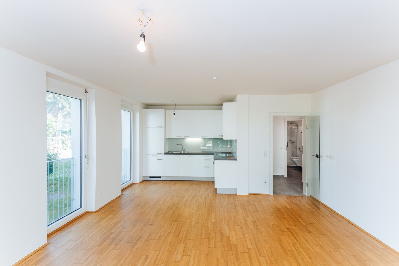 Sonnige Gartenwohnung - eingezäunt und begrünt! Mietpreis inkl. BK, HK und Tiefgaragenplatz!