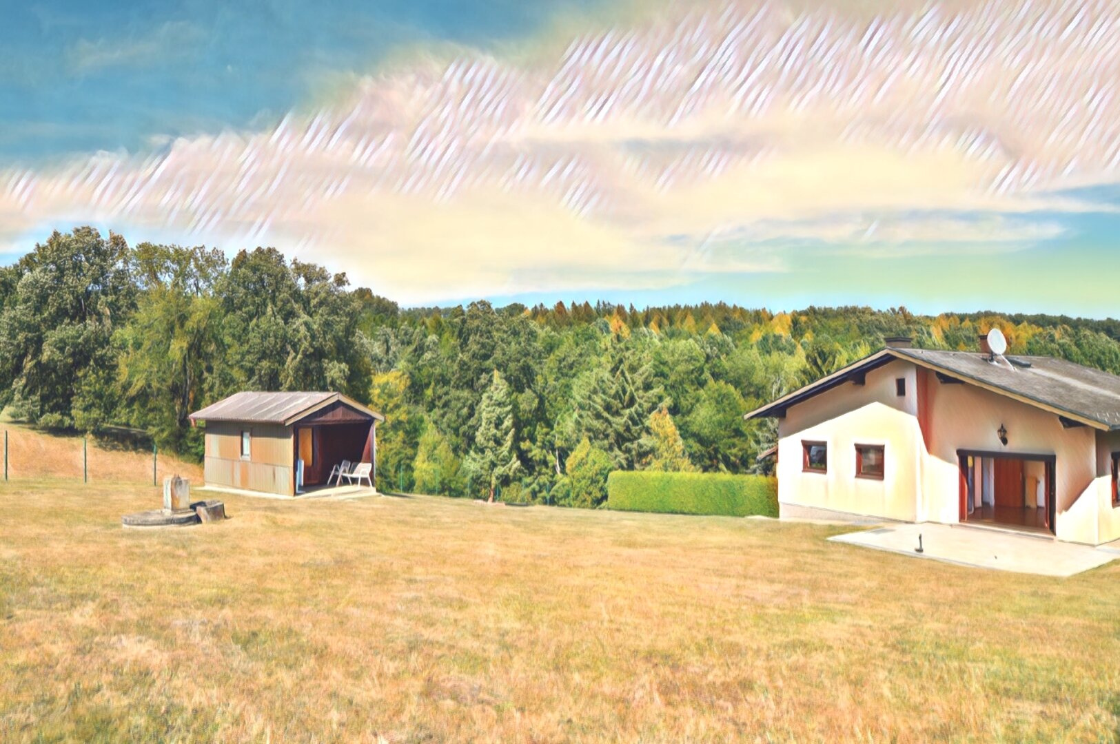 Blick auf das Wohnhaus samt Gartenhaus