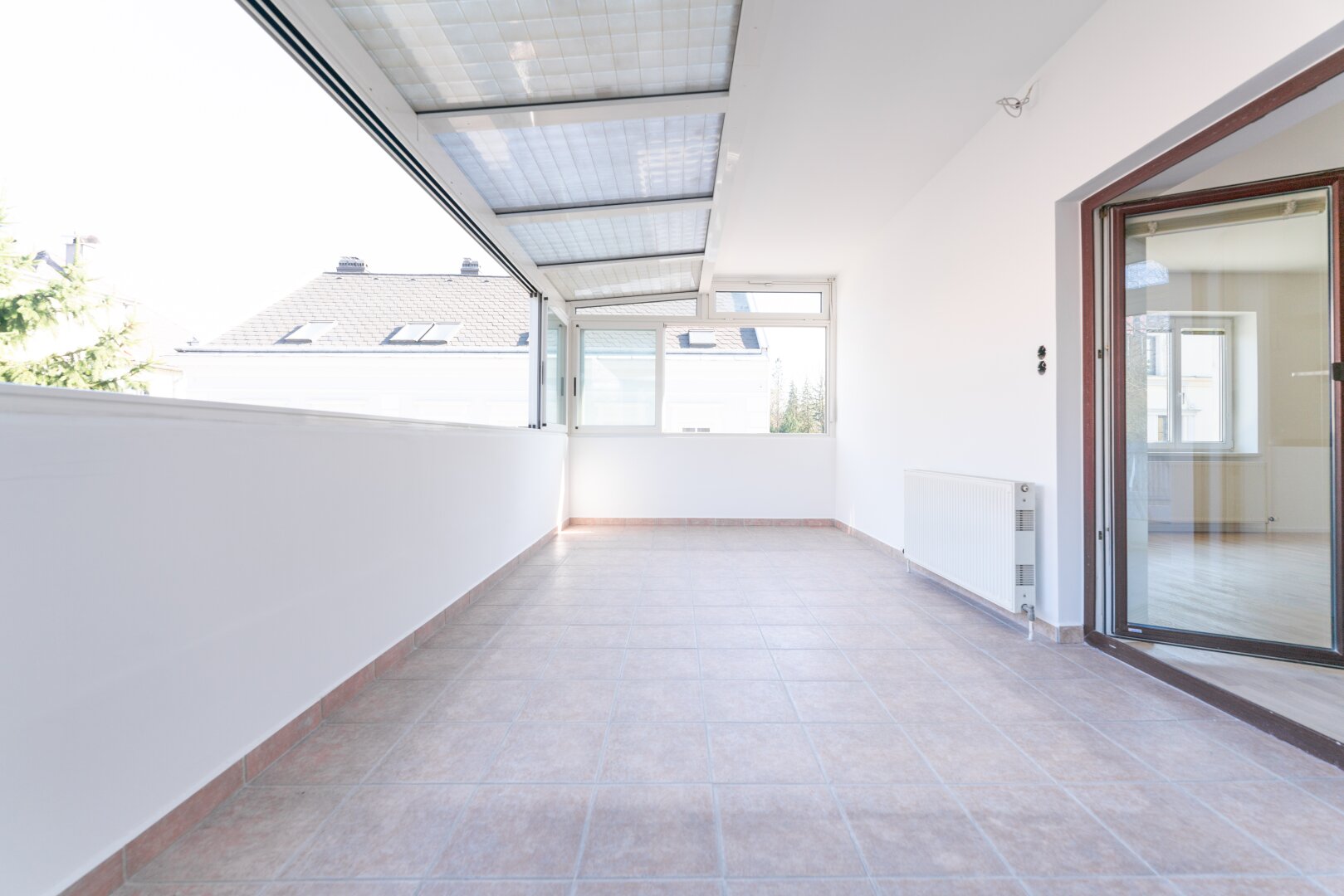 Charmante 2-Zimmer-Wohnung mit Wintergarten und Gartenzugang in stadtnaher Lage