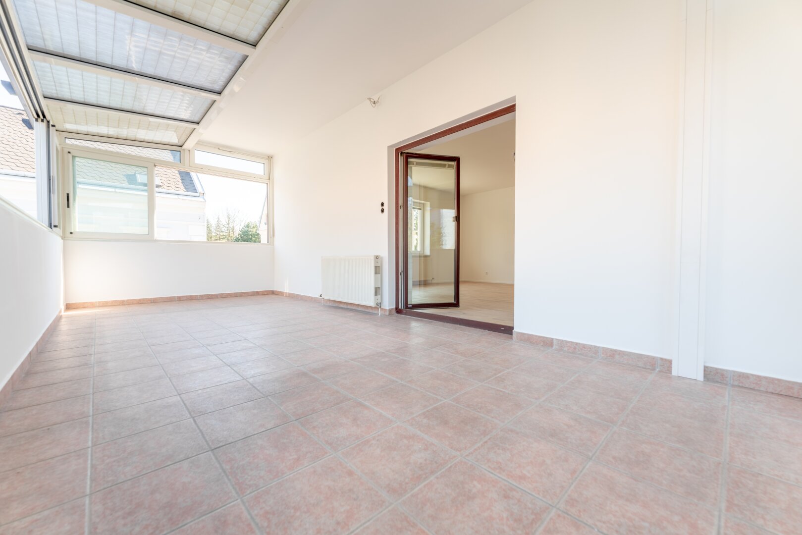 Charmante 2-Zimmer-Wohnung mit Wintergarten und Gartenzugang in stadtnaher Lage