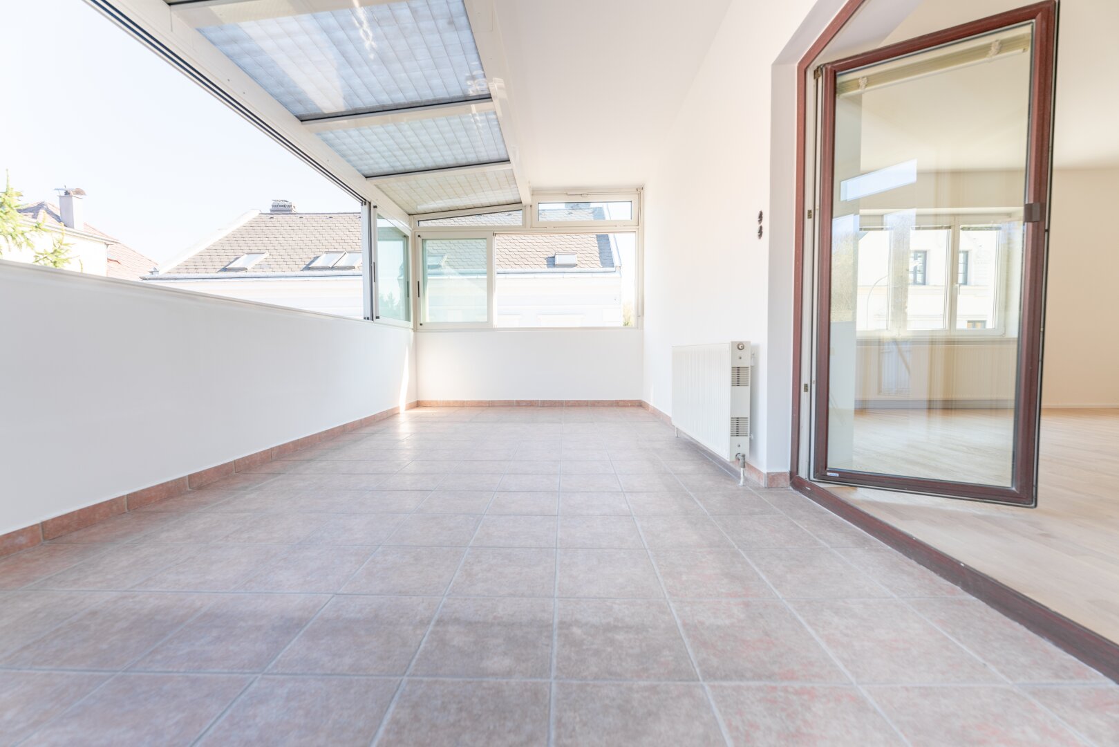 Charmante 2-Zimmer-Wohnung mit Wintergarten und Gartenzugang in stadtnaher Lage