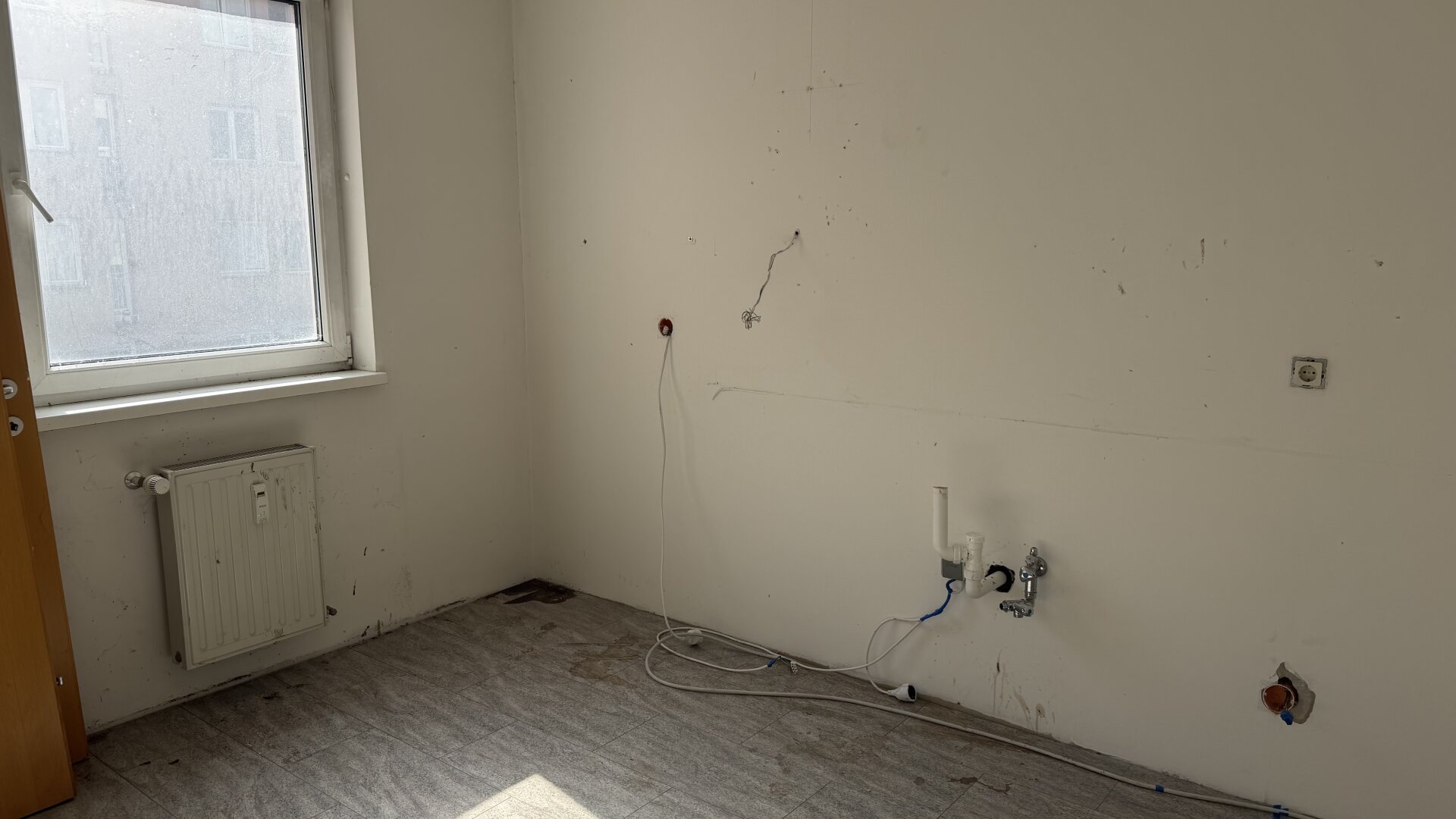 Kompakte Stadtwohnung mit Tiefgaragenplatz und Entwicklungspotenzial in Ottakring | ZELLMANN IMMOBILIEN