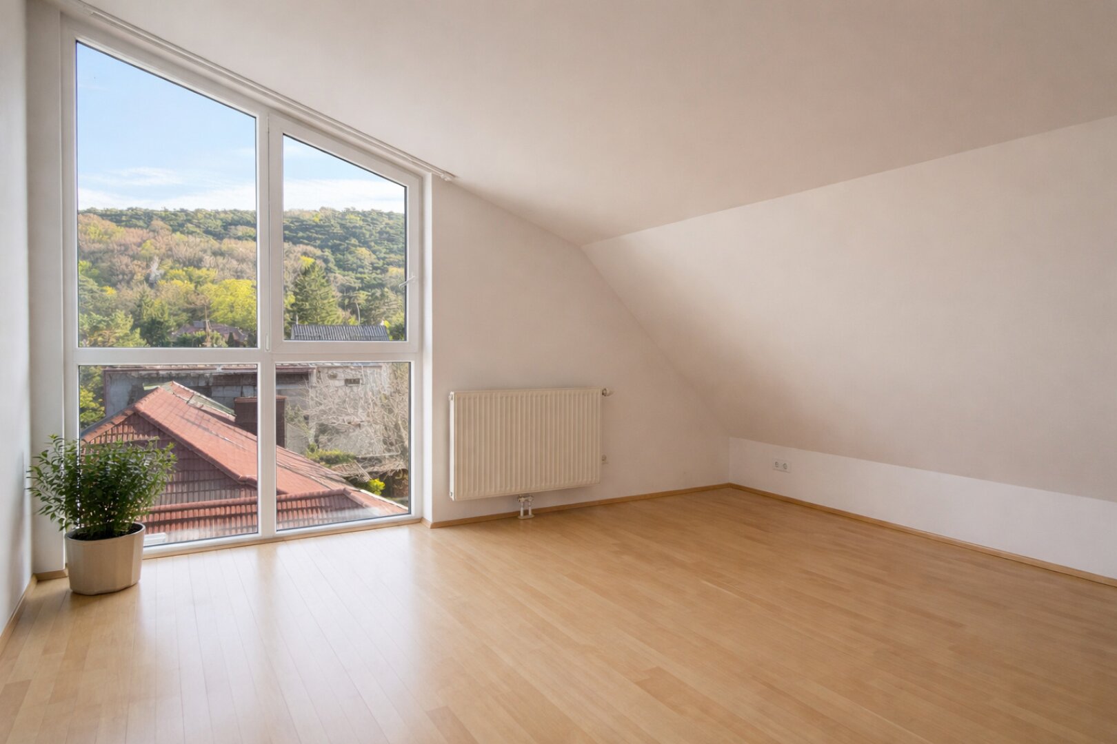 Lichtdurchflutete Dachgeschosswohnung mit Terrasse und Fernblick in Ruhelage von Wien-Rodaun | ZELLMANN IMMOBILIEN