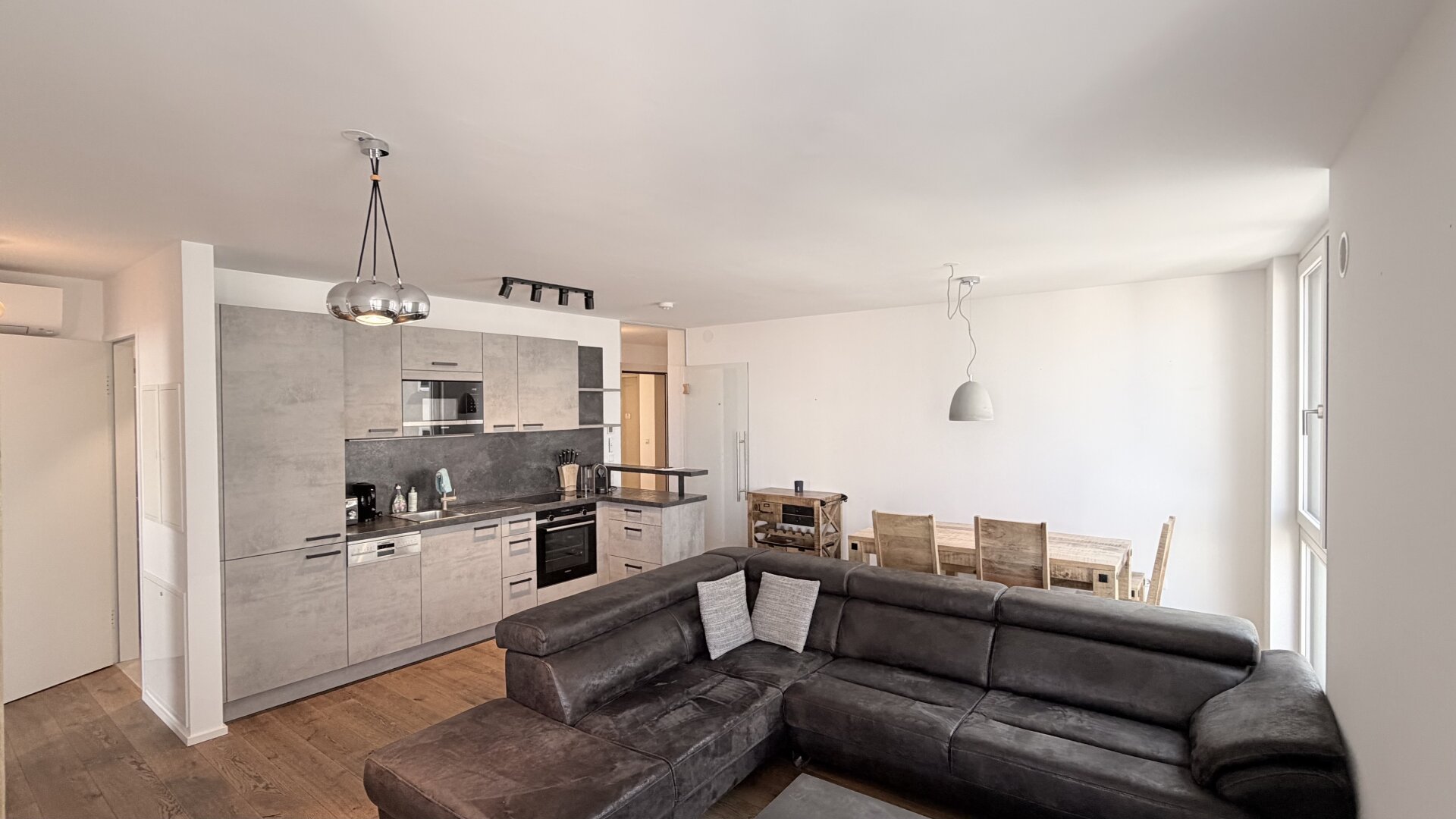 Exzellentes Wohnen in preisgekrönter Architektur – urbane Eleganz trifft nachhaltige Zukunft | ZELLMANN IMMOBILIEN