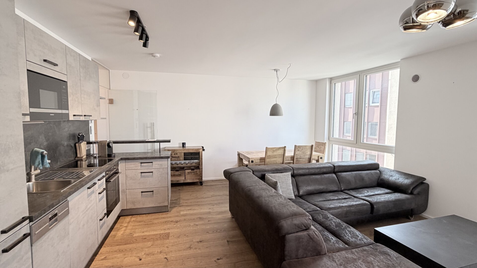 Exzellentes Wohnen in preisgekrönter Architektur – urbane Eleganz trifft nachhaltige Zukunft | ZELLMANN IMMOBILIEN