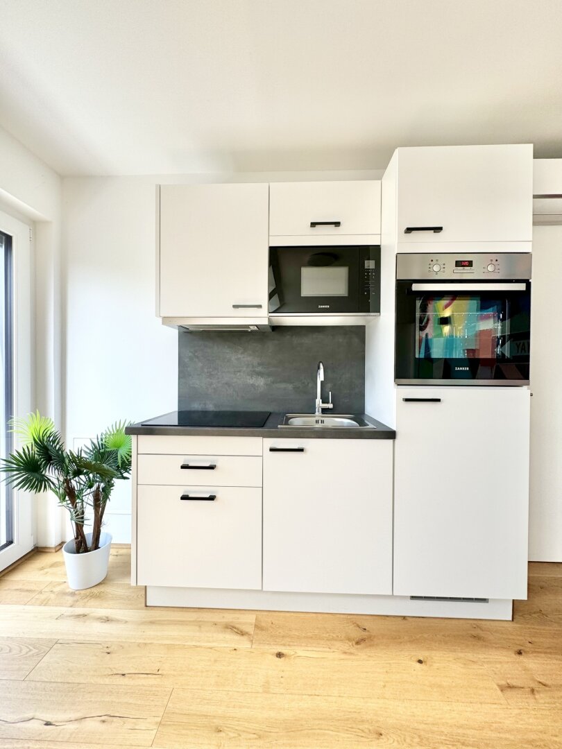 Stilvolle Dachgeschossresidenz mit hochwertiger Ausstattung und urbanem Wohnkomfort | ZELLMANN IMMOBILIEN